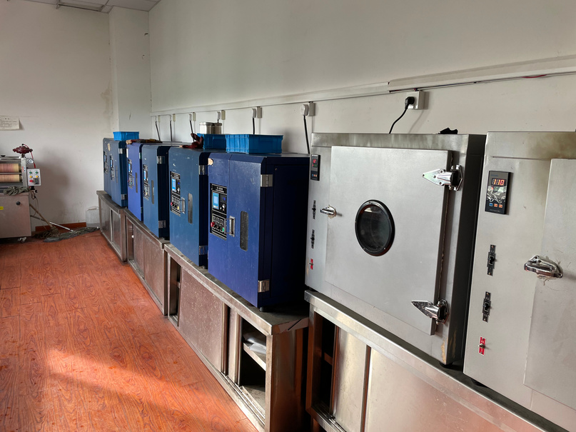 Row of textile testing instruments in the RyderTex laboratory.